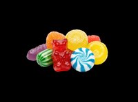 Colorful assorted candies and gummy bears pile, isolated on transparent background, ready for stickers, print on demand, T-shirt design, and clipart use.