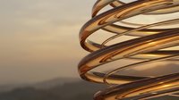 Abstract golden spiral sculpture with flowing metallic ribbons against warm sunset sky creating modern architectural art piece for luxury design concepts.