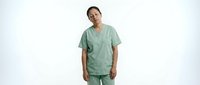 Middle-aged male healthcare professional wearing mint green scrubs, standing against white background with neutral expression, suitable for medical, hospital, and healthcare industry applications.