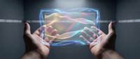 Hands holding glowing holographic display with colorful light waves and digital interface for technology, innovation, and futuristic concepts.