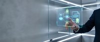 Businessman in dark suit interacting with holographic digital interface displaying security icons and data documents in modern glass enclosure with neon lighting.