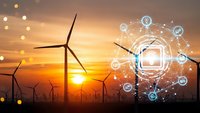 Smart energy management system with wind turbines at sunset showcasing renewable power technology and digital connectivity for sustainable future.