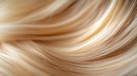 Smooth flowing waves of golden blonde hair strands create elegant abstract background pattern with soft silky texture and gentle curves in warm beige tones.