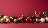 Festive Christmas ornaments and decorations arranged in a row against a deep red background, creating elegant holiday border for greeting cards.