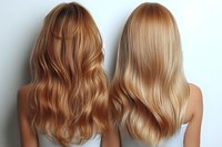 Two women with long hair from behind, showcasing copper red wavy and straight blonde hairstyles against light background. Perfect for salon advertising.
