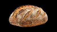 Rustic whole grain sourdough bread loaf isolated on transparent background, ready for bakery menus, food blogs, stickers, print on demand, and T-shirt design use.