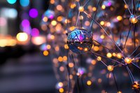 Glowing molecular structure with colorful bokeh lights in background, scientific network visualization for technology and research presentations.
