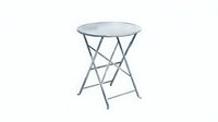 Folding metal bistro table with round glass top and gray steel frame, isolated on white background for interior design and furniture projects.