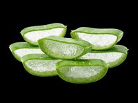 Aloe vera gel slices isolated on transparent background, ready for wellness, skincare, and cosmetic design projects including print-on-demand products, stickers, and sublimation applications.