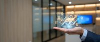 Businessman hand presenting holographic network icons in modern office space with glass walls and digital display for technology presentations.