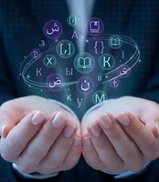 Hands holding glowing holographic letters and symbols from multiple languages, representing global communication, linguistics, and digital translation technology for international business.
