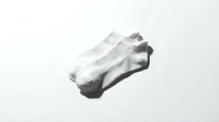 Pair of white ankle socks lying flat on a light background, showcasing minimalist style for fashion, retail, and lifestyle concepts.