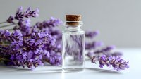 Glass bottle with cork stopper surrounded by fresh lavender flowers on light background, aromatherapy essential oil concept.