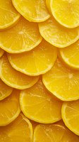 Fresh juicy orange slices arranged in overlapping pattern showing bright pulp and natural texture, macro photography for food and beverage industry use.