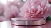 Pink metallic podium stage with soft floral background for product display and cosmetic presentation in feminine elegant setting.