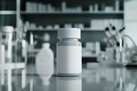 White medicine bottle on reflective surface in laboratory setting with microscope and scientific equipment in soft focus background. For pharmaceutical advertising.