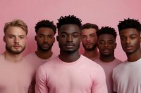 Diverse group of young men wearing pink and white sweaters standing together against pink background, modern fashion portrait in minimalist style.