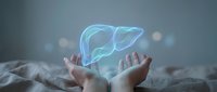 Holographic liver organ floating above open hands in medical healthcare concept for hepatology treatment and organ donation awareness.