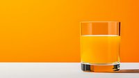 Fresh orange juice in clear glass on white surface against vibrant orange background, minimalist food photography composition for healthy lifestyle and beverage concepts.