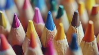 Vibrant colored pencils in macro view showing sharp tips against blurred background, creating artistic composition for education and creativity concepts.