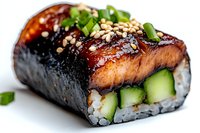 Fresh unagi sushi roll with grilled eel, cucumber, rice, nori seaweed, and sesame seeds garnished with green onions and sweet sauce in macro view.