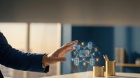 Businesswoman hand gesturing over glowing digital network icons representing connected technology, data exchange, and smart business solutions for corporate communications and innovation concepts.