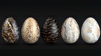 Luxurious Easter eggs decorated with gold and silver patterns on black background. Collection of elegant ornamental eggs with metallic floral designs.