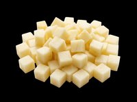 Diced cheese cubes isolated on transparent background, ready for culinary design, food packaging, recipe graphics, cooking blogs, restaurant menus, and print-on-demand food illustrations.