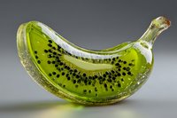 Glass kiwi fruit sculpture with green translucent material and black seeds, artistic food representation on gradient background for modern decor.