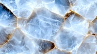 Macro view of blue calcite mineral with golden veins creating abstract geometric pattern on polished surface. Natural stone texture for luxury interior design.