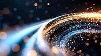Glowing particles swirl in dynamic waves of blue and gold light against dark background, creating abstract energy flow for technology and innovation concepts.