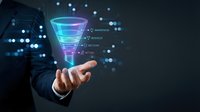 Businessman hand presenting holographic sales funnel with marketing stages awareness interest decision action on dark technology background.