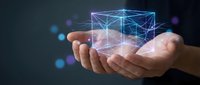 Hands holding glowing digital wireframe cube with network connections and particles, representing technology, data, innovation, and digital transformation concepts.