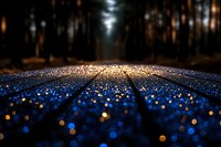 Magical glowing blue and gold bokeh lights scattered across dark wooden planks create dreamy perspective leading into misty forest at night, atmospheric nature background.