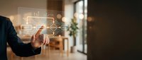 Businessman hand touching digital network connection icons in modern office environment representing technology connectivity and business communication solutions.