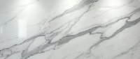 White marble surface with elegant gray veining patterns for luxury interior design and architectural applications.