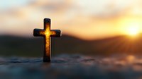 Glowing Christian cross silhouette against dramatic sunset sky and mountain landscape background, spiritual symbol radiating warm light for religious themes.