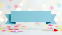 Blue ribbon banner on white background with colorful confetti scattered around for celebration and party design projects.