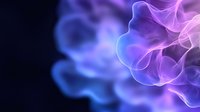 Ethereal flowing smoke in vibrant blue and purple hues against dark background creates mesmerizing abstract pattern with smooth curves and translucent layers.