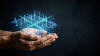 Mature male hands holding glowing digital cityscape hologram with interconnected buildings and data networks, representing smart city technology, urban development, and innovation solutions.