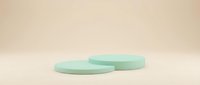 Two mint green circular podiums on a soft beige background, minimal product display stand for cosmetics, beauty, or retail presentation.