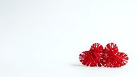 Red wicker hearts on white background for Valentine's Day romantic decoration, love concept, wedding design, greeting cards and holiday crafts.