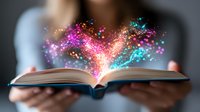 Open book with magical glowing sparkles and colorful light particles emerging from pages, held by female hands. Concept of imagination, storytelling and reading.