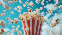 Flying popcorn kernels bursting from red and white striped container against turquoise background, creating dynamic motion effect for entertainment and cinema concepts.