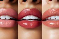 Close up of three female lips with different shades of lipstick showing perfect white teeth smile. Macro beauty shot for cosmetic and dental advertising.