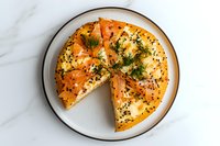 Sliced bagel sandwich with smoked salmon, cream cheese, fresh dill and black sesame seeds served on white ceramic plate against marble background.