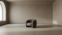 Modern black curved armchair in minimalist beige interior space with arched window, contemporary furniture design for home decor and interior styling projects.