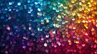Vibrant rainbow colored crystal cubes pattern with gradient from cool blue to warm orange and red tones creating abstract mosaic background for creative designs.