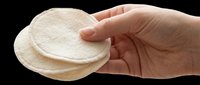 Hand holding reusable cotton facial pads isolated on transparent background, ready for T-shirt design, stickers, clipart, print on demand, and sublimation projects.