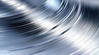 Metallic silver wave pattern with smooth curved lines and dynamic motion effect creates modern abstract background with light reflections and glossy surface.